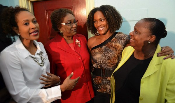 Rudolph Brown/Photographer
Bridgette Foster Hylton, (second right) chat with from left Allison Watson, National Chair Public relation committee of Jamaica Red Cross,  Carole Powell, former president and Audrey Mullings at the Jamaica Red Cross 2012 Launch Membership Campaign media briefing at Knutsford Court Hotel on Monday, October 8, 2012