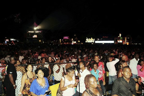 Photo by Sheena Gayle
A fair sized audience watches the performances at Reggae Sumfest on Friday's International Night 1 at the Catherine Hall Entertainment Complex in Montego Bay.