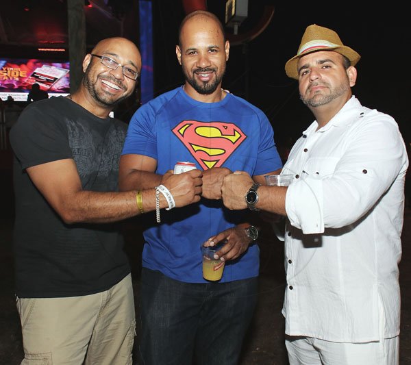 Ashley Anguin Rafael Garcia (centre) takes centre stage in his superman T-shirt, flanked by Dhilon Rodricks (left) and Jose Moreno. *** Local Caption *** Ashley Anguin Rafael Garcia (centre) takes centre stage in his superman T-shirt, flanked by Dhilon Rodricks (left) and Jose Moreno.