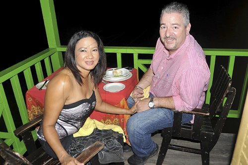 Sheena Gayle photo
Tai Flora?s Dr Paulette Hossman (left) and husband Sascha Hossmann enjoyed the culinary delights at Houseboat Grill in Montego Bay during Restaurant Week on Saturday.