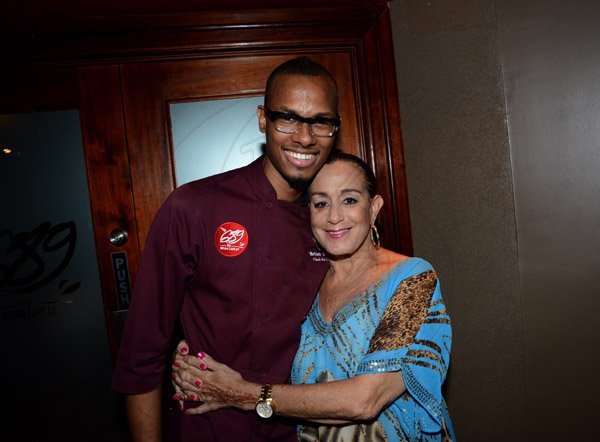 Winston Sill/Freelance Photographer
Restaurant Week ambassador Camille Davis  and guest ----????  dine, at 689 Brian Lumley, Trinidad Terrace, New Kingston  on Monday night November 17, 2014. Here are Brian Lumley (left); and Stephanie Scott (right).