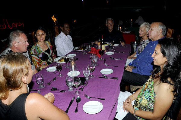 Winston Sill / Freelance Photographer
Restaurant Week feature with Gleaner Chairman Oliver Clarke and guest diining, at Red Bones Blues Cafe, Argyle Road on Monday night November 5, 2012. Here, from left are Zoe Bridger; Steven Morgan; Lisa Johnston;  Dr. Nigel Clarke; Charles Johnston; Kelly Tomblin; Oliver Clarke; and Rupie Clarke.