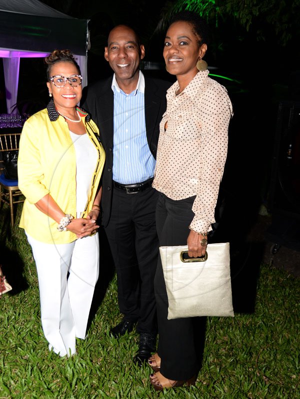 Jermaine Barnaby/ Freelance PhotographerMelody Cammock-Gayle (left) Garfield Daley (center) and Diana Allen of FHC at the RJRGLEANER CLIENT APPRECIATION AWARDS at the Sunken Gardens at Hope Botanical Gardens on Thursday, June 22, 2017.