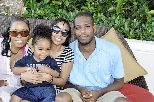 Janet Silvera Photo
 
From L- Dacia Smith, Raquel DeFreitas, Donte Smith and Lexford Earle at ADS Global's Ron McKay's poolside party with his 'breddas' at the Palmyra Resort and Spa in Montego Bay last Saturday afternoon