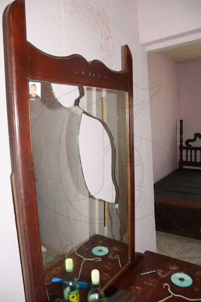 Ian Allen/Staff Photographer
Glass that was said to have been broken by the ghost throwing items


Furnitures that was damaged by Duppy in a house in Rose Hall District, St.Elizabeth.