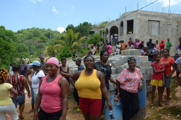 Ian Allen/Staff Photographer
Scores of people turn up in Rose District in St.Elizabeth to try see the Duppy that has been terrorising Residents of a hoise in the area.