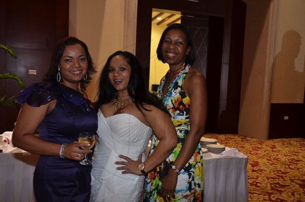 Janet Silvera Photo

From L- Rose Hall Development's Cynthia Scott and Sharon Singh pose with CIBC First Caribbean Bank's Valda Stewart at the Rose Hall Holiday at the Montego Bay Convention Centre in Montego Bay last Saturday night.