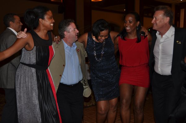 Janet Silvera
No other group had as much fun as this one! From L- Digicel's Trisha Thompson, the group's CEO, Andy Thorburn, Suzanne Saunders, Joy Clark and ADS Global's Ron McKay dancing up a storm at the Rose Hall Holiday Ball at the Montego Bay Convention Centre last Saturday night
