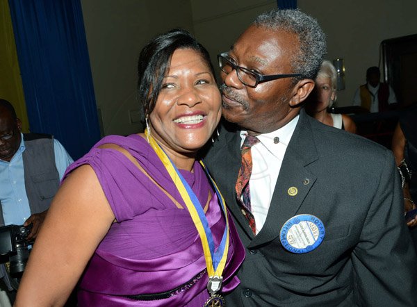 Rudolph Brown/ Photographer
Business Desk
Dr. Lloyd Ebanks-Green kissed new president Marie Powell after she was installed at the Rotary Club of St. Andrew  Installation banquet at the Jamaica Pegasus Hotel in New Kingston on Tuesday, July 9, 2013.