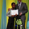 Ricardo Makyn/Staff Photographer
Richard Byles President and Ceo  Sagicor presents Mathew-Pierre Rogers who will be attending Campion  at the Sagicor annual GSAT awards ceremony at the Knutsford Court Hotel on Thursday 23.8.2012
