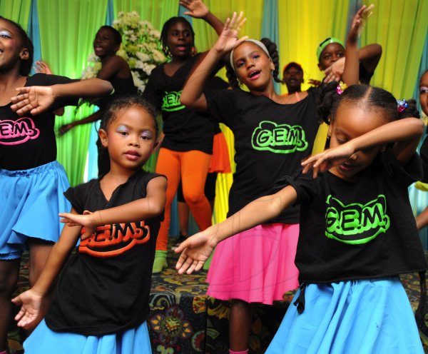 Ricardo Makyn/Staff Photographer
Members of the G.E.M Pantomime group performing at the Sagicor annual GSAT awards ceremony at the Knutsford Court Hotel on Thursday 23.8.2012