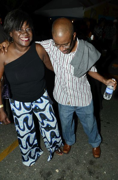 Rudolph Brown/Photographer
Willard Brown, Vice President Risk Management , Actuary of Sagicor dance with Janice Grant-Taffe at the Sagicor memba dis Christmas party at the office car park in New Kingston on Saturday, December 8-2012