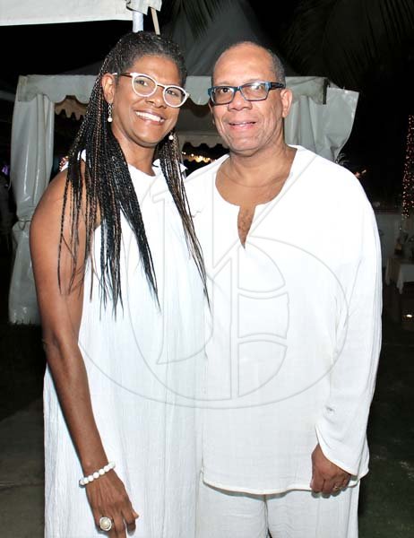 Ashley Anguin<\n>Ann-marie Williams is all smiles with her husband Jon at Sans Souci's 'Enchanted themed 12th anniversary celebrations.
