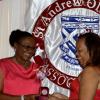 Winston Sill/Freelance Photographer
PUBLIC AFFAIRS DESK:------ Fay McIntosh (left) receives the Saint Award from Marlize McCartney at the St Andrew Old Girls Association (SAOGA)  annual Valentine Dinner and Dance, held at Terra Nova All-Suite Hotel, Waterloo Road on Saturday night February 7, 2015.