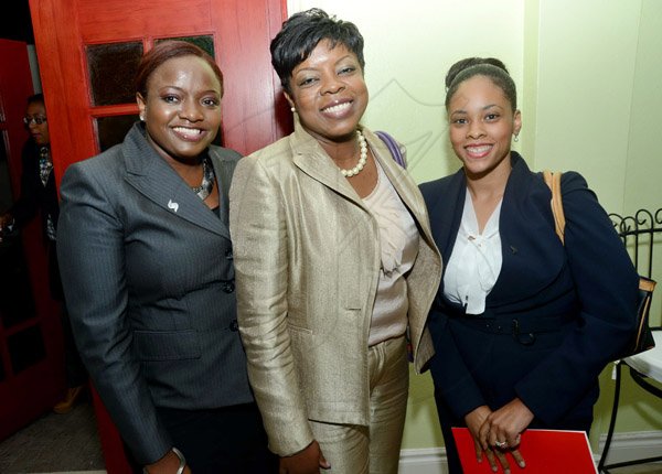 Rudolph Brown/Photographer
From left are Lakishma Thomas, Georgia morrison and Daniella Jackson, corporate banking officer with the corprate and commercial banking ventre pose at the Scotiabank Cocktails and Conversations panel discussion at the Knutsford Court Hotel in New Kingston on Wednesday, May 15, 2013