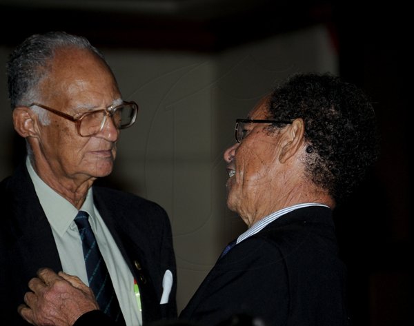 Winston Sill / Freelance Photographer
The St. Elizabeth Homecoming Foundation Limited (SEHF) 20th Annual Golden Awards Banquet, held at the Jamiaca Pegasus Hotel, New Kingston on Wednesday night November 28, 2012. Here are Dr. Alfred Sangster (left); and Kingsley Sangster (right).