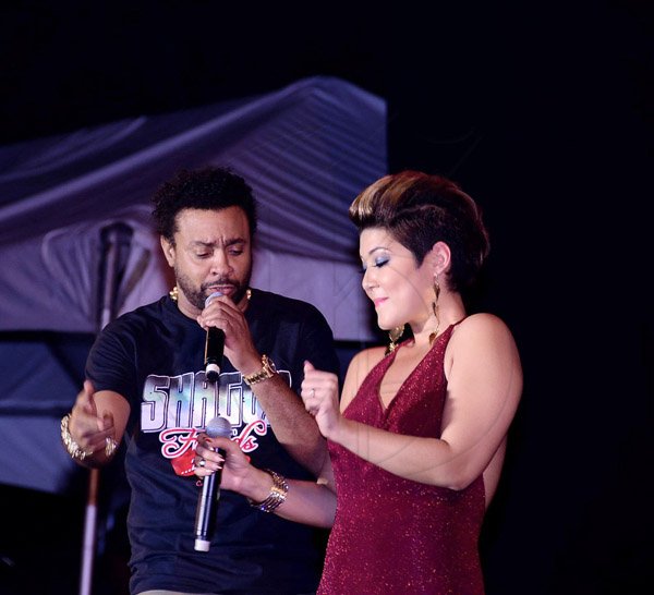 Winston Sill/Freelance Photographer
Orville 'Shaggy' Burrell has newly minted 'Voice' Tessanne  Chin rocking to the beat during the Shaggy and Friends charity concert held Saturday at Jamaica House in St Andrew. See story on C1.