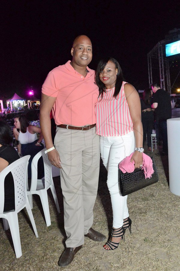 Ian Allen/Photographer
Shaggy and Friends in Concert

Subtly is key for this happy couple. Ryan Parkes chose to wore a cool salmon, while his wife Opal puts a twist of fashion in her outfit and matches in a salmon and white striped top.
