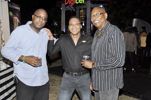Janet Silvera Photo
From L- Irie FM's Duane 'DJ Bones' Howard and Rainforest Seafoods' Roger Lyn and Ernie Grant at the Shaggy & Friends show at Jamaica House last Saturday night