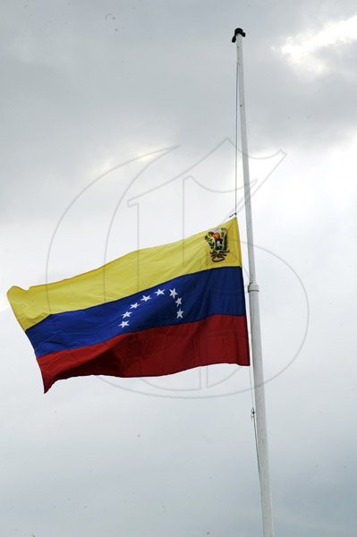 Norman Grindley/Chief Photographer
Venezuela flag fly half-mast at the Simon Bolivar Statue in Kingston yesterday.