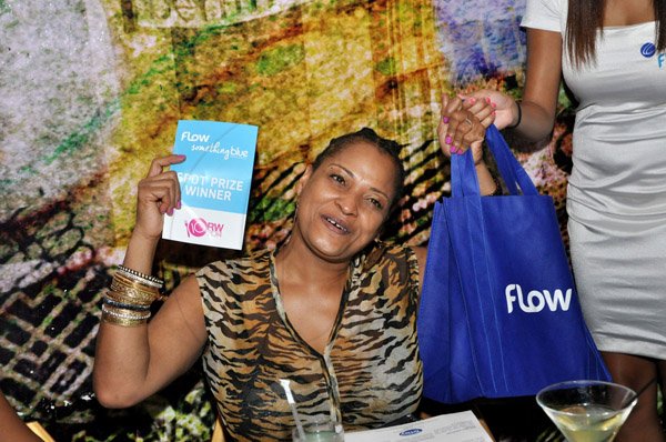 Jermaine Barnaby/Photographer
Crystal Heron from New Jersey was a Something Blue Challenge spot prize winner during RW at usain bolt's tracks and records on Tuesday, November 18, 2014.