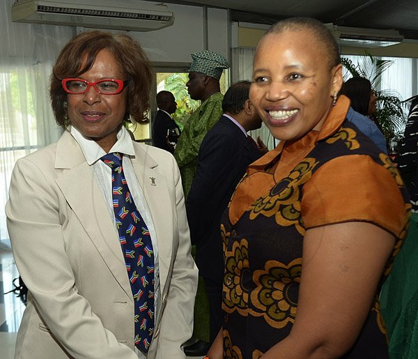 Ian Allen/Photographer
Mathu Joyini right, High Commissioner of the Republic of South Africa pose with Pamela Bridgewater left, US Ambassador to Jamaica during a Luncheon to Celebrate
 the 19th Anniversary of the Republic of South Africa’s Freedom Day. The luncheon was held at the Terra Nova Hotel in KIngston on Friday.