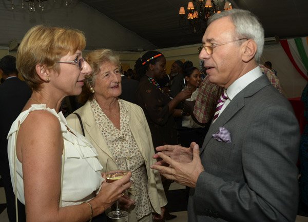 Ian Allen/Photographer
Vladimir Polenov right, Russian Ambassador to Jamaica chats with Andrea Bickhoff-Benjamin left and Sylvia Collister centre during the 19th Anniversary of the Republic of South Africa’s Freedom Day. The luncheon was held at the Terra Nova Hotel in Kingston on Friday.