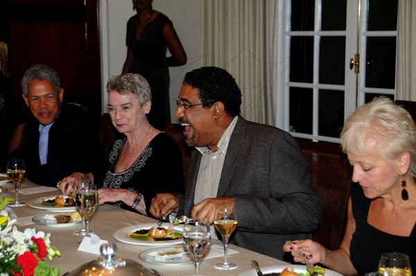 Winston Sill / Freelance Photographer
Spanish Ambassador Celsa Nuno  in association with Gran Bahia Principe Hotel host Gourmet Dinner Party, held at Norbrook Road on Wednesday night November 21, 2012. Here are Donovan Perkins (left); Glynn Manley  (second left); Minister Wykeham McNeill (second right); and Kelly Tomblin (right).