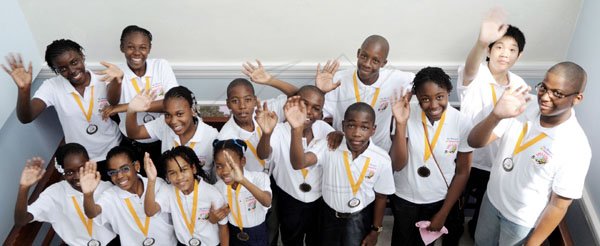 Ricardo Makyn/Staff Photographer.
The Fourteen Parish Finalist in this Years Gleaner Spelling Bee Competition that will be Held at the Jamaica Pegasus on Wednesday. Back Row From left Daviesh Mills St Ann,Tenescia Watson Hanover ,Teneel Palmer Portland,Owayne Rodney Clarendon,Hanif Brown,Delroy  Fong St Andrew Front row  From left Front Row Camara Webber of Westmoreland,Adriena Cribb of St James,Lariecia Harvey Trelawny,Lois Robinson St Elizabeth,Davian Stewart St Catherine,Jonmore Hyamn Manchester,Jenelle Hinds St Mary,Treamaine Dixon Kingston.