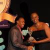 Winston Sill / Freelance Photographer
Runner-up to the Sportsman of the Year Yohan Blake (left) receives his trophy from RJR Sports Foundation board member Grace Jackson at the RJR National Sportsman and Sportswoman Award Ceremony, at the Pegasus Hotel on Friday.