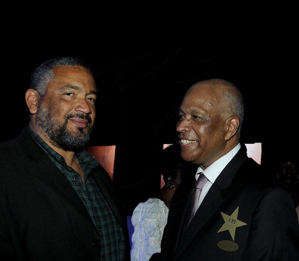 Winston Sill / Freelance Photographer
The Lay Persons Initiative (LPI) of The United Church in  Jamaica and the Cayman Islands presents "A Starry Night' Dinner and Concert, held at Jamaica House on Friday night December 7, 2012. Here are Winston Roman (left); and Randolph?? Scott (right).