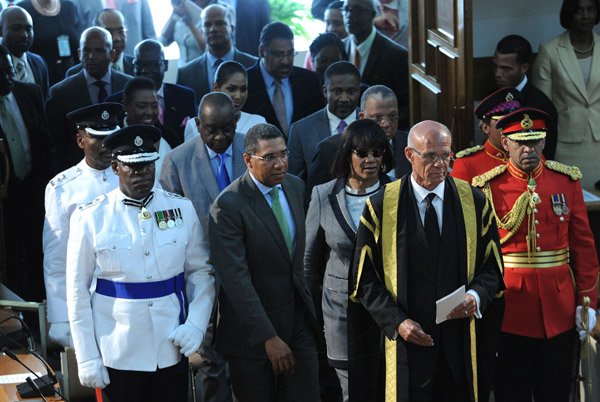 Ricardo Makyn/Staff Photographer 
Leader of the Opposition Hon Andrew Holness and Prime Minister  the Most Hon Portia Simpson Miller lead their members of Parliament into the chambers at the state opening of Parliament at Gordon House on Thursday 3.4.2014