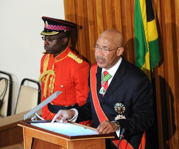 Ricardo Makyn/Staff Photographer 
Governor General of Jamaica His Excellency Sir Patrick Allen giving the throne speech at the state opening of Parliament at Gordon House on Thursday 3.4.2014