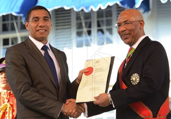 Rudolph Brown/Photographer
Andrew Holness swearing in as new Prime Minister at King's House on Sunday, October 23-2011