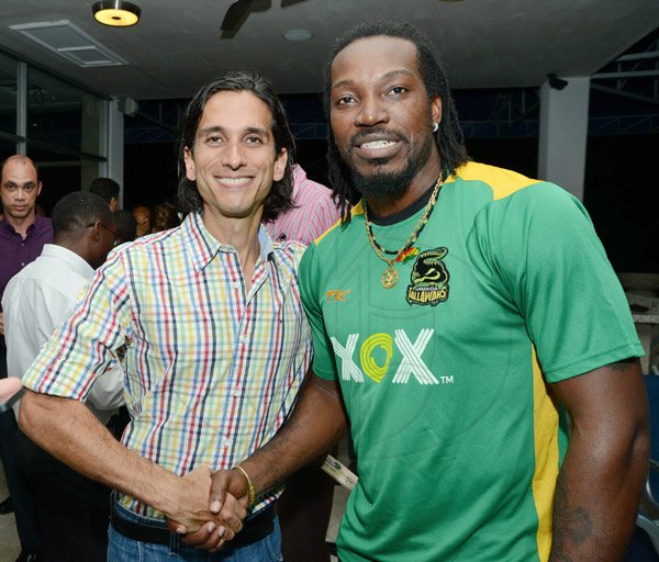 Rudolph Brown/ Photographer
Michael Subratie (left) and Chris Gayle at a welcome reception on Wednesday night hosted by XOX for members of the Jamaica Tallawahs cricket team at the Pegasus Hotel.