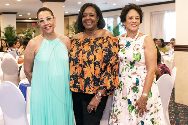 *** Local Caption *** @Normal:Past Chairs of the Women's Leadership Initiative from left:  Eva Lewis, Marcia Erskine and Sharon Lake share their beautiful smiles with our lens.<\n>