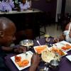 Winston Sill/Freelance Photographer
 Stacy Ann Hemmings-Wallace as she dines with her husband Oneil Wallace
