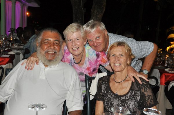 Janet Silvera Photo
 
Caribic Vacation's Gordon and Ann Townsend (seated in front) and Henry Clemmons and Bridgitte White of Virginia, pose for the social pages.

*************************************************** at the reopening of Half Moon's Sugar Mill restaurant Wednesday night in Montego Bay.