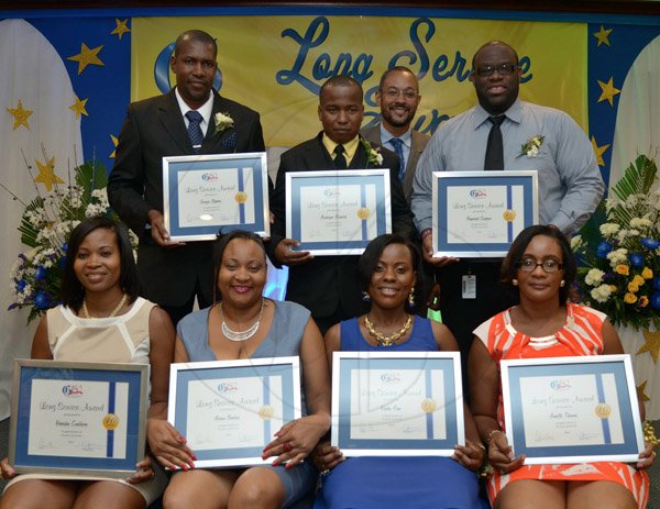 Ian Allen/Photographer
Staff members who were awarded for 10
 years of service to the Company during the Long Service Awards Cermony at the Jamaica Pegasus Hotel in Kingston on Tuesday.
