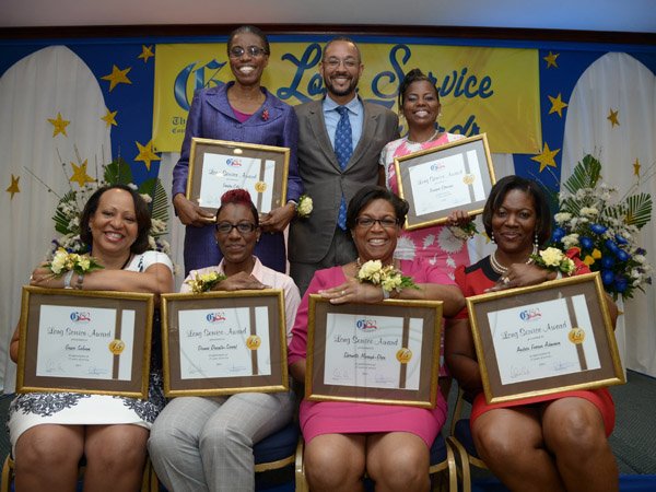 Ian Allen/Photographer
Staff members who were awarded for 15 years of service to the Company during the Long Service Awards Cermony at the Jamaica Pegasus Hotel in Kingston on Tuesday.
