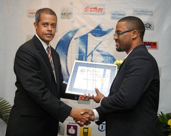 Gladstone Taylor / Photographer

Gleaner long service and pensioners award held at the Jamaica Pegasus yesterday afternoon