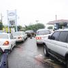 Ricardo Makyn/Staff Photographer
Motorist queue to fill up their tanks at Michael service station on Duke Street as Tropial Storm Sandy approaches Jamaica