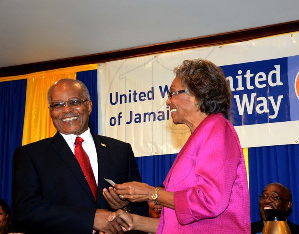 Winston Sill/Freelance Photographer
United Way of Jamaica annual Nation Builders'  Awards and  Employee Awards Ceremony, Held at the Jamaica Pegasus Hotel, New Kingston on Thursday September 11, 2014. Here are Sir Kenneth Hall (left); and Lady Rheima Hall (right).