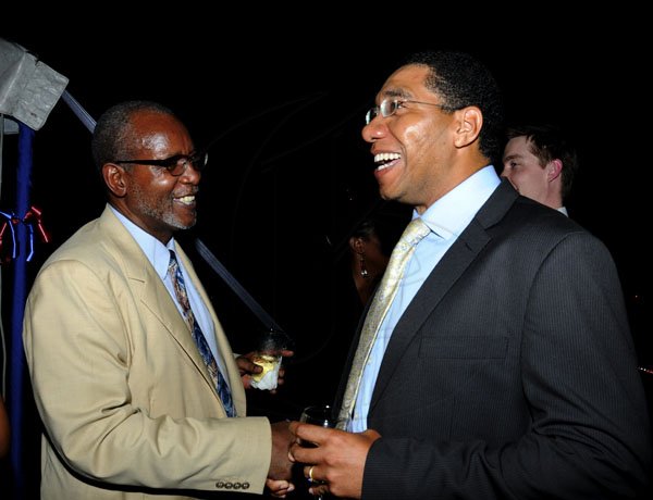 Winston Sill / Freelance Photographer
US Ambassador Pamela Bridgewater host Presidential Election Watch Reception, held at Paddington Terrace on Tuesday night November 6, 2012. Here are US Deputy Chief of Mission Dr. Raymond Brown (left); and Andrew Holness (right).