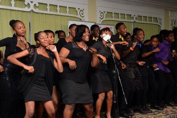 Winston Sill/Freelance Photographer
USAID/Jamaica host Appreciation Reception for their various partners and the private sector, for over 52 years, held at the Knutsford Court Hotel, Ruthven Road on Tuesday night December 9, 2014. Here members of Vauxhall High School Choir in performance.