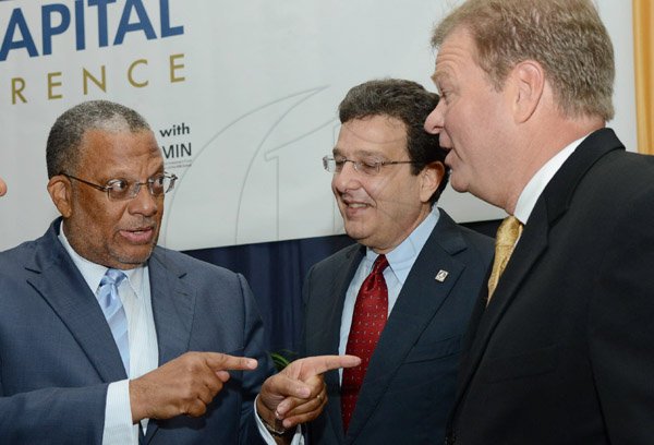 Rudolph Brown/Photographer
Business Desk
Guest speaker Paul Ahlstrom, (right) Managing Director of Alta Ventures Mexico, Alta Group Americas in discussion with Dr Peter Phillips, (left) Minister of Finance Planning and Public Service and Joseph M. Matalon, Chairman of Development Bank of Jamaica at the Venture Capital One Day Conference at Jamaica Pegasus Hotel in New Kingston on Monday, September 9,2013