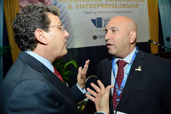 Rudolph Brown/Photographer
Business Desk
PSOJ president Christopher Zacca (right) chat with Joseph M. Matalon Chairman of Development Bank of Jamaica at the Venture Capital One Day Conference at Jamaica Pegasus Hotel in New Kingston on Monday, September 9,2013