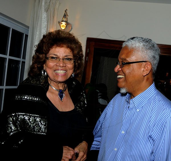 Winston Sill / Freelance Photographer
UWI Vice Chancellor Prof. Nigel Harris host Christmas Party, held at Long Mountain Road, UWI, Mona on Thursday night December 8, 2011. Here are Sheila Graham?? (left); and Prof. Harris (right).