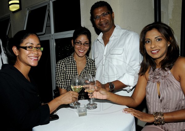 Winston Sill / Freelance Photographer
Spanish Court Hotel and J. Wray and Nephew  presents Wine Tasting Mondays, held at Spanish Court Hotel, St. Lucia Avenue, New Kingston on Monday night November 26, 2012. Here are Lee-Ann Godfrey (left); Tara Bradshaw (second left); Richard Pandohie (second right); and Nicole Pandohie (right).
