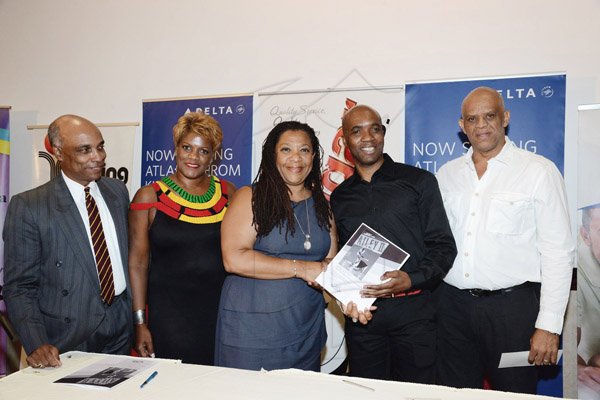 Winston Sill/Freelance Photographer
PUBLIC AFFAIRS DESK:-----Pauline Findlay (centre) trustee and chair of the Wolmer's Board of Management, and Troy Powell (second right), artistic director of Ailey II, show the paperwork after signing the agreement to bring the dance company to Jamaica to celebrate Wolmer's 285th anniversary. Looking on are (from left) Wolmerians Christopher Samuda, Michelle Wilson-Reynolds and Conrad Graham.
Wolmers Trust presents the Media Launch of Ailey2, held at the Jamaica Pegasus Hotel, New Kingston on Thursday night may 29, 2014.